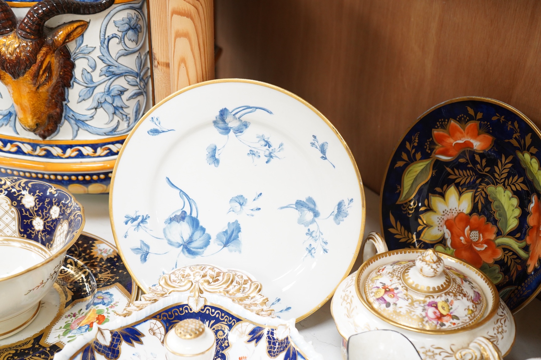 A collection of early 19th century English porcelain tea, dessert and dinner wares including Derby dessert plates, Bloor Derby, Barr Flight & Barr plate, Spode, Coalport etc.